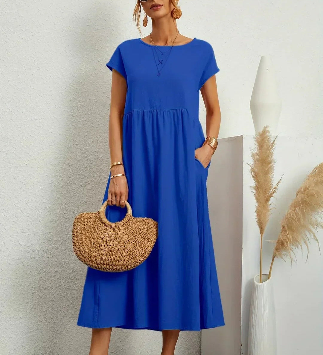 Adéla – Volné midi šaty s kapsami pro každodenní eleganci