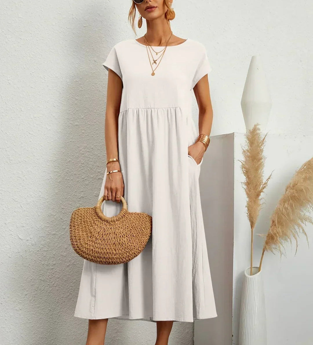 Adéla – Volné midi šaty s kapsami pro každodenní eleganci